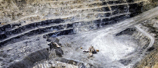 View of Cut 62 during orpiment collecting operation, note heavy equipment. Collector’s Edge photo.