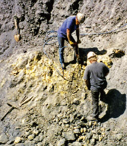 Working in orpiment rich zone using a drill hammer. Collector’s Edge photo.