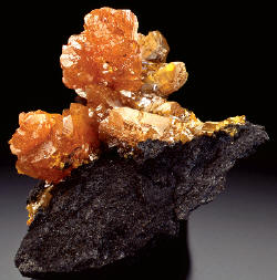 Spectacular specimen of orpiment crystals on matrix; 2.4 cm high. 