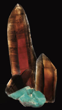 Same specimens photographed in two diffrent lightings showing transparency of the quartz crystals. 12.5 cm in length. Pinnacle 5 Minerals specimen. J. Callén photo.