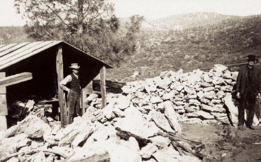 Stockpile of benitoite-rich natrolite veins at the mine in 1908. At this time etching ofspecimens was not use, and not many specimens survived mechanical preparation... Photo courtesy of Collector’s Edge.