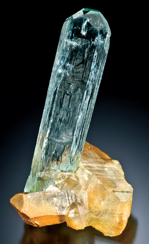 Gem beryl (var. aquamarine) with quartz from Sakangyi, 7.5 cm high. W. Larson collection.J. Scovil photo.