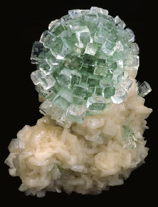 “Disco ball” apophyllite on stilbite fromthe first find in 2001, 12 cm high. HMNScollection. J. Scovil photo.