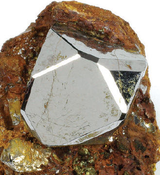 Sperrylite crystal 1.1 cm high. Wallbridge specimen. B. Wilson photo.