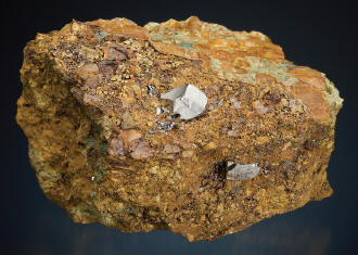 General view of the specimen and closeup of the sperrylite crystal in breccia matrix. Crystal 1.5 cm wide. Wallbridge specimen. M. Bainbridge photos.