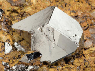 General view of the specimen and closeup of the sperrylite crystal in breccia matrix. Crystal 1.5 cm wide. Wallbridge specimen. M. Bainbridge photos.