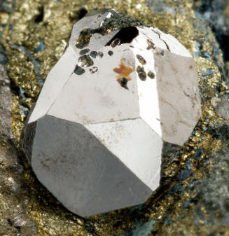 Sperrylite crystal 7 mm high. Wallbridge specimen. M. Bainbridge photo.