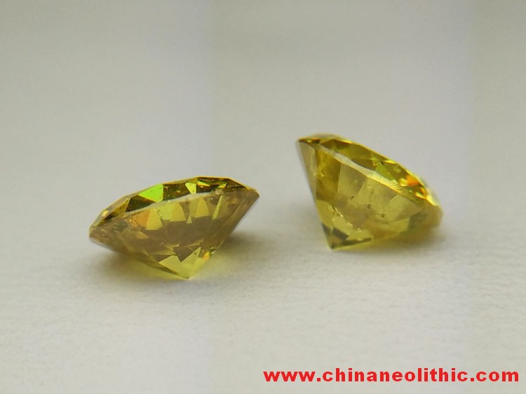 Yellow green sphalerite circular faceted gemstone ring section naked Shi Qiang fire color seven colo,Sphalerite